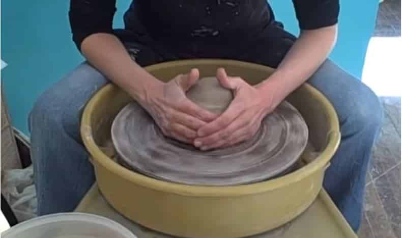 throwing a pottery bowl