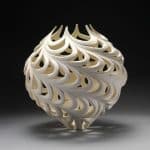 Porcelain wheel thrown; atlered carved fired to cone 10